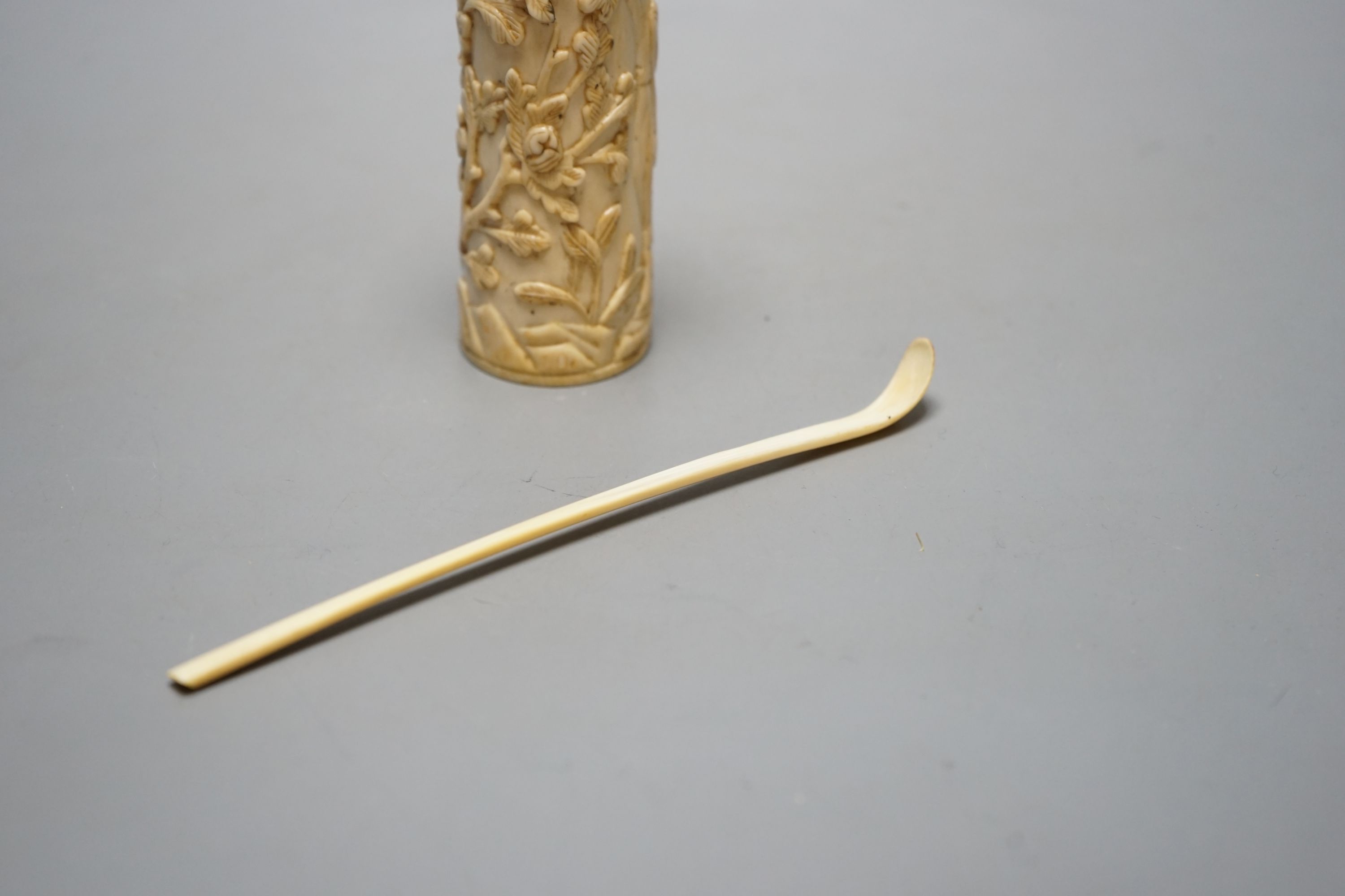 A Chinese 19th century ivory snuff spoon and a brush pot with lady, brush pot 12 cms high.